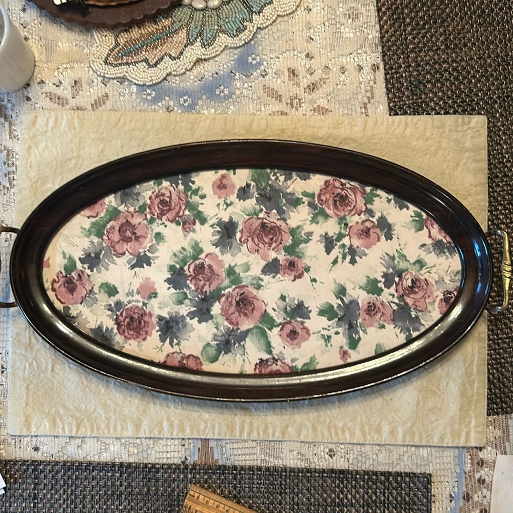 Fancy tray with metal handles. Bottom is covered with felt.